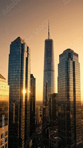 Skyscrapers Reflecting Golden Hour Sun in City Skyline