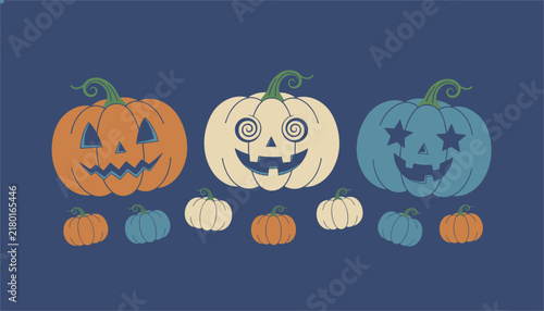 Three carved jack-o'-lanterns with funny faces sit alongside smaller pumpkins on a dark blue background creating a festive halloween mood.