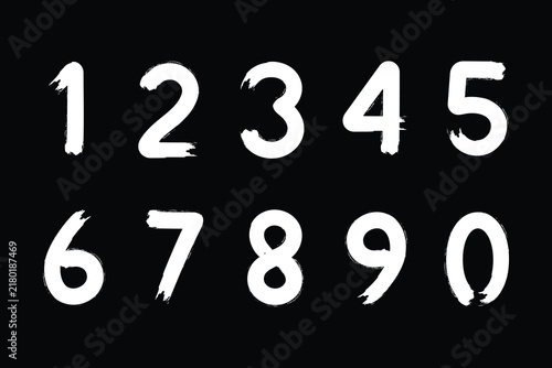 Hand-drawn grunge brushstroke numbers from zero to nine vector illustration