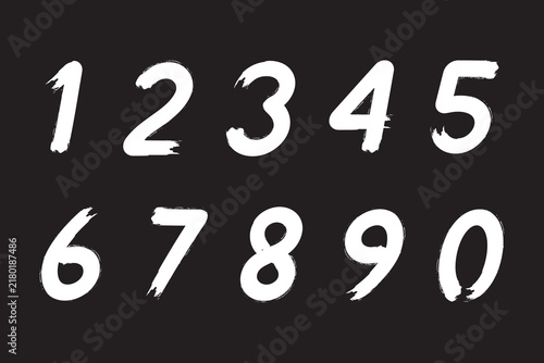 Hand-drawn grunge brushstroke numbers from zero to nine vector illustration
