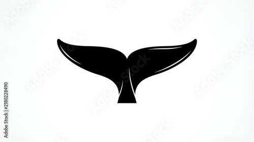 Black whale tail fluke swimming underwater
