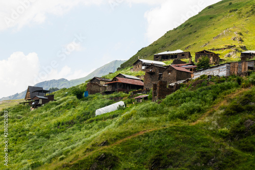 A striking view of the historic village of Chigo, perched dramatically on the steep mountain slopes of Tusheti