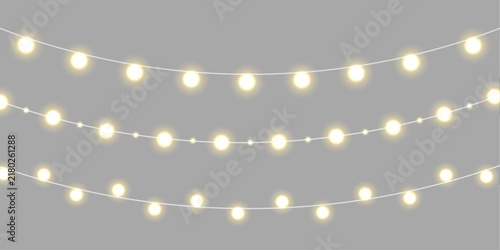 Brilliant Christmas strand adds luminous detail. Tiny lights create a graceful rhythm. Isolated PNG decoration for seasonal graphic design.