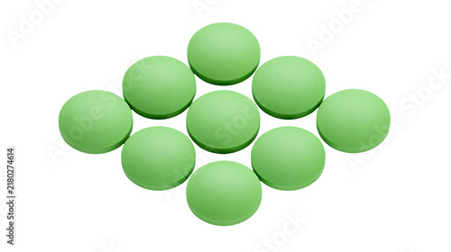 Bild auf Leinwand Group of ten round green pills arranged in a diamond pattern, isolated on transp