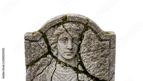 Canvastavla Cracked weathered stone tombstone with carved face and moss, isolated on transpa