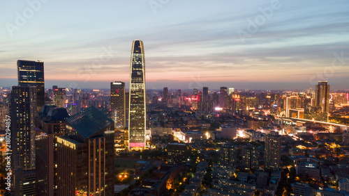 Twilight Cityscape with Illuminated Skyscrapers