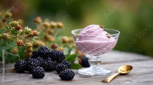blackberry yogurt in traditional presentation with a background of a blackberry plantation 