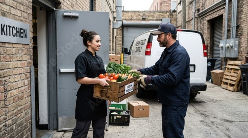 Restaurant employee receiving fresh produce delivery from service worker