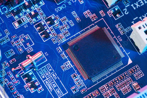 Canvas Print CPU microprocessor silicon chip installed inside motherboard socket next to BIOS