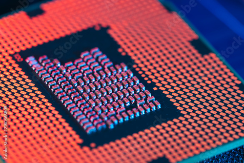 Canvas Print CPU microprocessor silicon chip installed inside motherboard socket next to BIOS