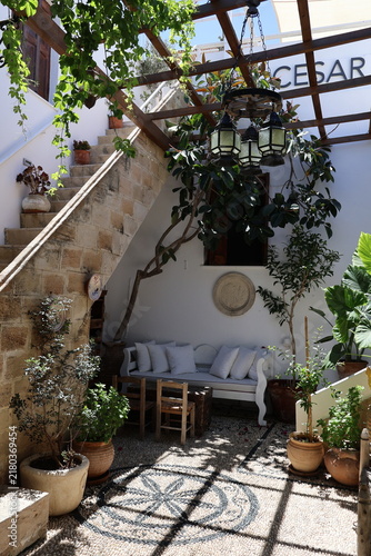 фотографія outdoor patio with tables and chairs
