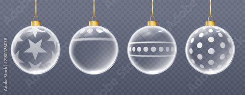 Transparent glass Christmas balls hanging from elegant ribbons, featuring glossy surfaces, snow details, and festive holiday