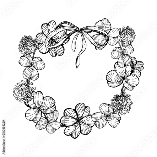 Clover leaves and flowers wreath with a ribbon bow hand drawn vector ink sketch Illustration. Engraving line art botanical frame for Celtic greeting cards, Irish branding, Invitation, festive poster.