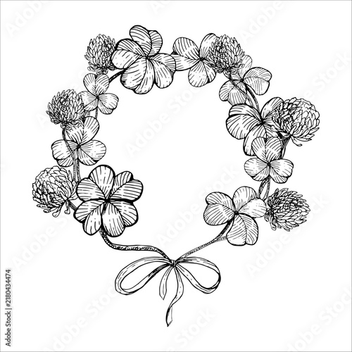 Clover leaves and flowers wreath with a ribbon bow hand drawn vector ink sketch. Engraving line art botanical frame for St Patricks day greeting cards, Irish branding, Invitation and festive poster.