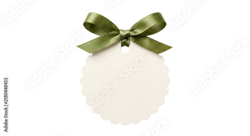 Konstfotografi Scalloped round paper tag with olive green silk bow on transparent background
