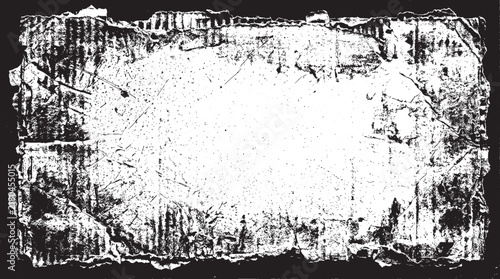 Rectangular frame with torn cardboard edges and a distressed scratched texture isolated on a black background for