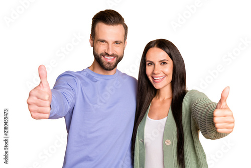 Quadro su tela Photo of optimistic couple show thumb up wear sweater isolated on beige color ba