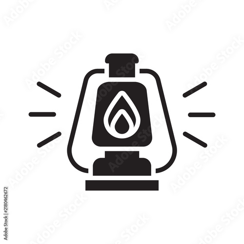 Glowing camping lantern emitting light rays