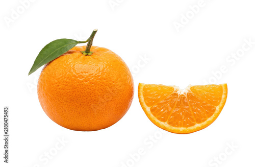 Whole orange with a leaf and a slice of orange on a white background