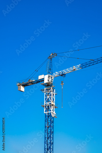 construction crane on the background of the sky