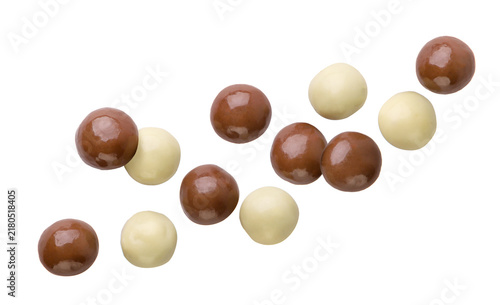 Chocolate balls flying on a white background. Isolated