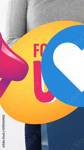 Animation of follow us text, megaphone and heart icons over caucasian woman with shopping
