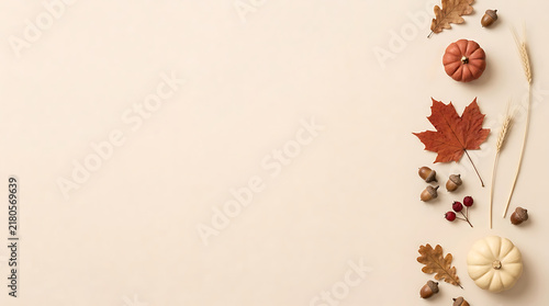 Autumn harvest border with orange pumpkins and dry leaves on cream background for seasonal thanksgiving celebration greeting cards and social media post.