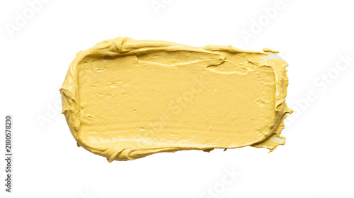 Принти на полотні Thick mustard yellow cosmetic clay cream smear with uneven ridges and natural so