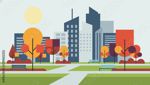 Scenic urban park landscape with green grass, trees, benches, and tall city skyscrapers under bright sun.