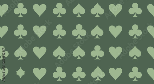 Pattern of playing card suits hearts diamonds clubs spades on green background casino game element texture.