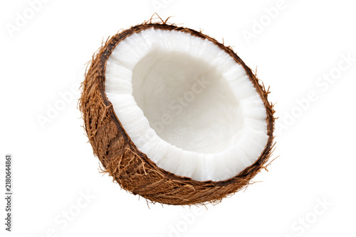 Bild auf Leinwand Halved mature coconut showing thick creamy flesh and a fibrous brown shell, isolated on a clean white background for tropical food, healthy eating, and culinary ingredient concepts
