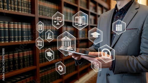 Professional Lawyer Using Digital Tablet with Legal Law Icons in Traditional Library Setting for Legal Research and Consultation Services