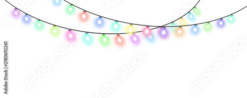 Colorful string of glowing holiday lights hanging