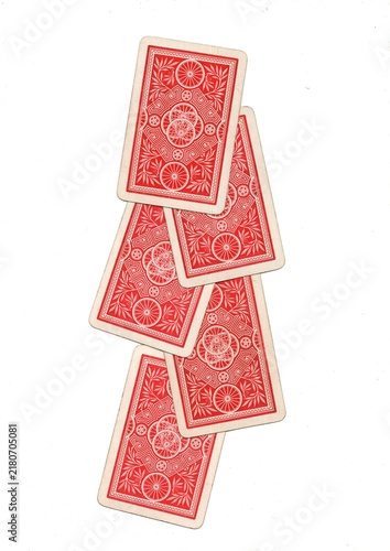 A hand of vintage playing cards isolated on a white background.