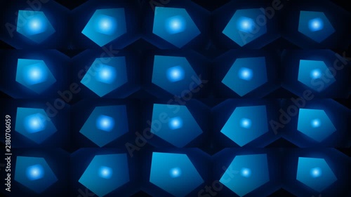 A grid of glowing blue pentagonal shapes set against a dark background