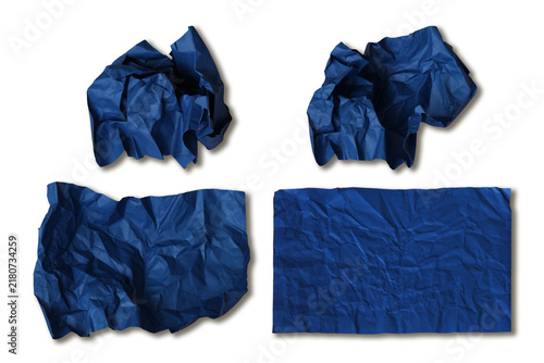 Collection of four dark blue crumpled paper sheets and balls for grunge graphic design on a transparent background