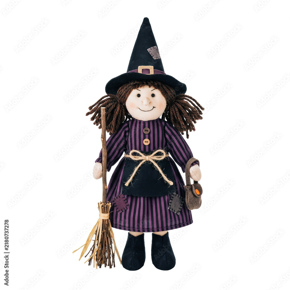 Obraz premium Witch doll with broom and bag on white background