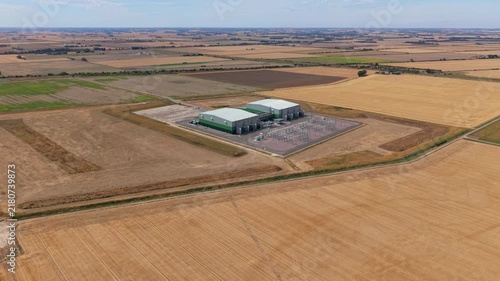 Aerial view of the Viking Link HVDC Converter Station surrounded by vast agricultural fields in Donington, England, United Kingdom.