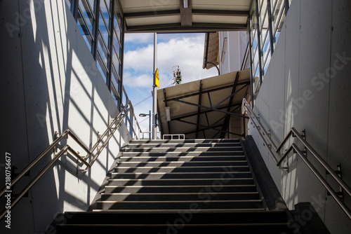 Underground Passage Stairs Leading Up to Railway Platform