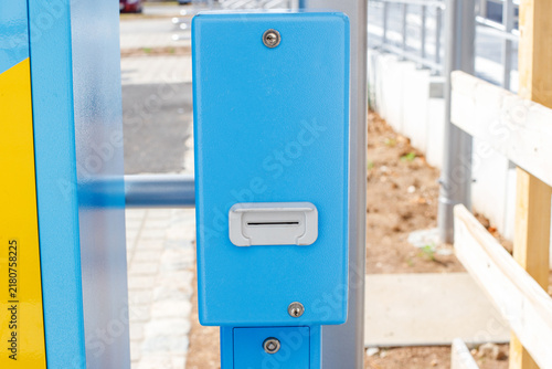 Close Up of Blue Ticket Machine Coin Slot or Card Insertion Point