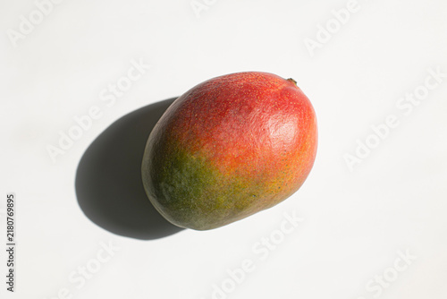Obraz na płótnie Red mango fruit, isolated on white