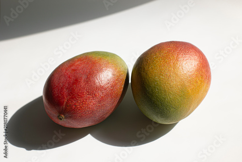 Obraz na płótnie Red mango fruit, isolated on white