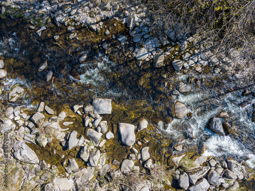 фотографія Aerial top-down view of Murg River rapids and boulder-strewn streambed in Murgta