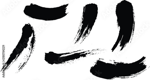 Set of black ink brush strokes on a white background