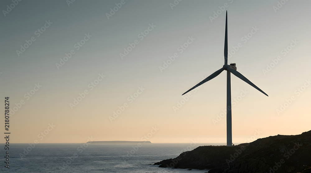 Obraz premium Wind turbine, energy and power on coast with renewable source, clean electricity and environment at sunset. Sustainable, offshore and ecological with engineering, industry and landscape for light air