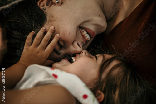 Obraz na płótnie Mother and child bonding with laughter and love