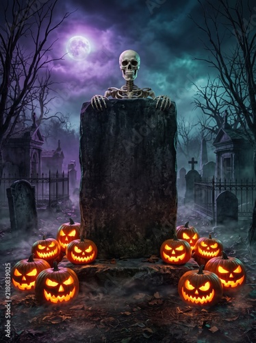 A skeleton peeks out from behind a large tombstone in a foggy graveyard, surrounded by glowing jack o lanterns under a crescent moon.