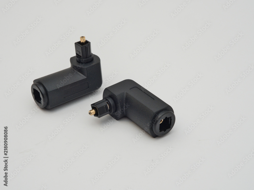 Foto Two Right-Angle Toslink Optical Adapters - Two black right-angle Toslink optical