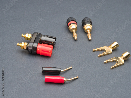 Canvas Print Audio Connectors and Adapters on Gray - A selection of gold-plated audio connect