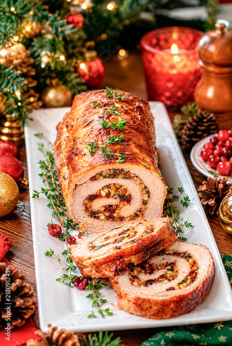 Apple and bacon-stuffed pork loin roll, Christmas theme, Merry Christmas, December atmosphere., grilled chicken breast with vegetables